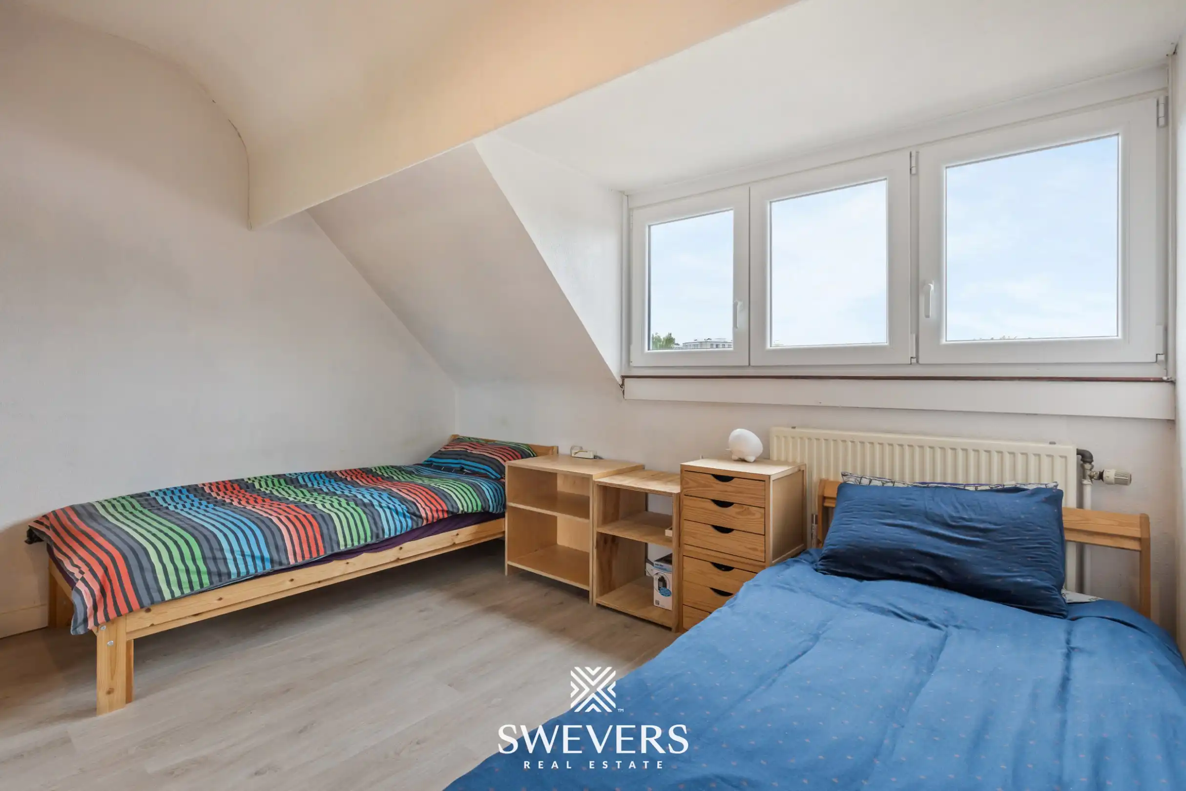 Instapklare rijwoning met 2 zeer ruime slaapkamers en uitstekende ligging foto 15