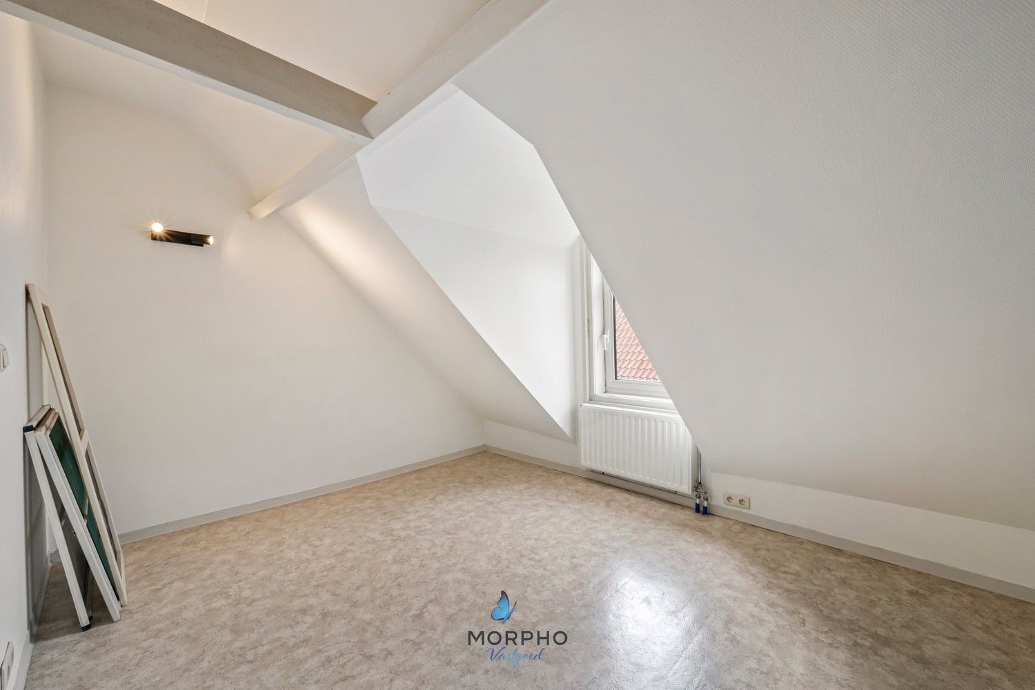 Te opfrissen rijwoning met 3 slpks en zonnige koer in centrum Brugge foto 12