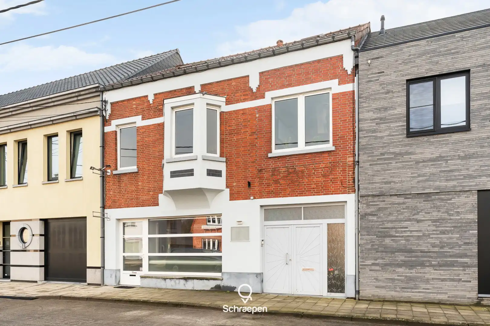 Karaktervolle woonst met handelsruimte op absolute toplocatie in Zonhoven-centrum! foto 24