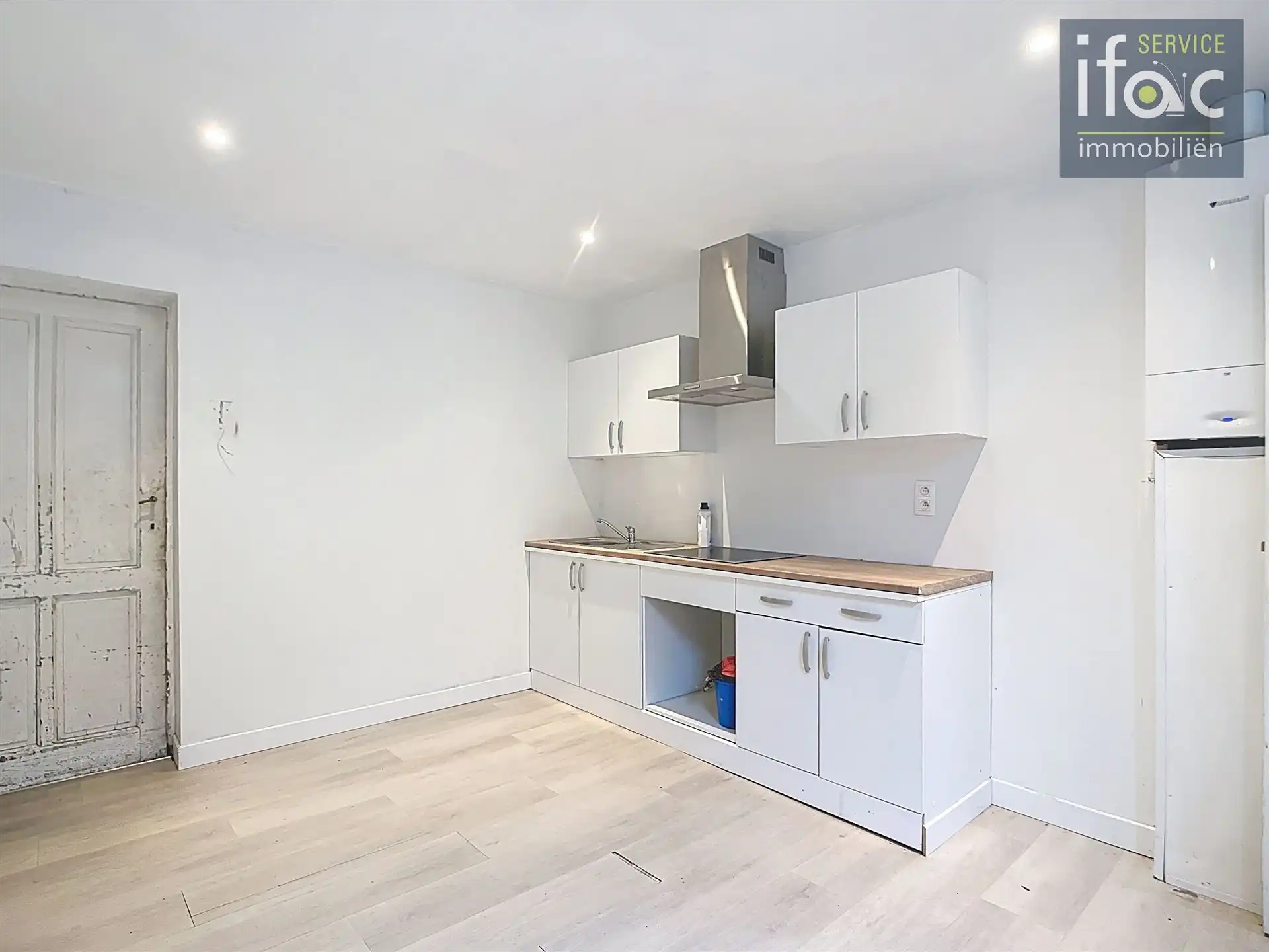 Opbrengstgebouw met handelsruimte en appartment foto 10