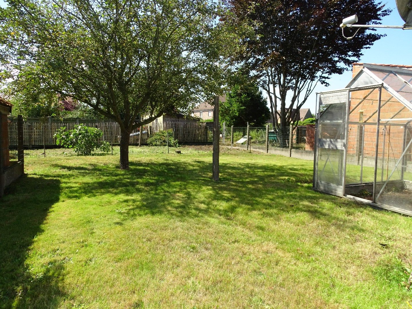 Te renoveren woonst met leuke tuin en garage foto 13