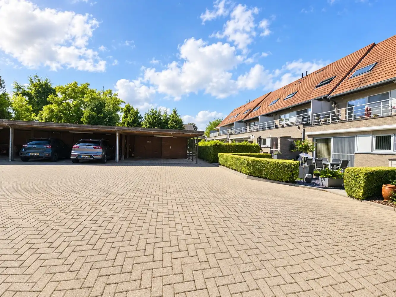 Duplex appartement met ruim terras en carport/berging foto 23