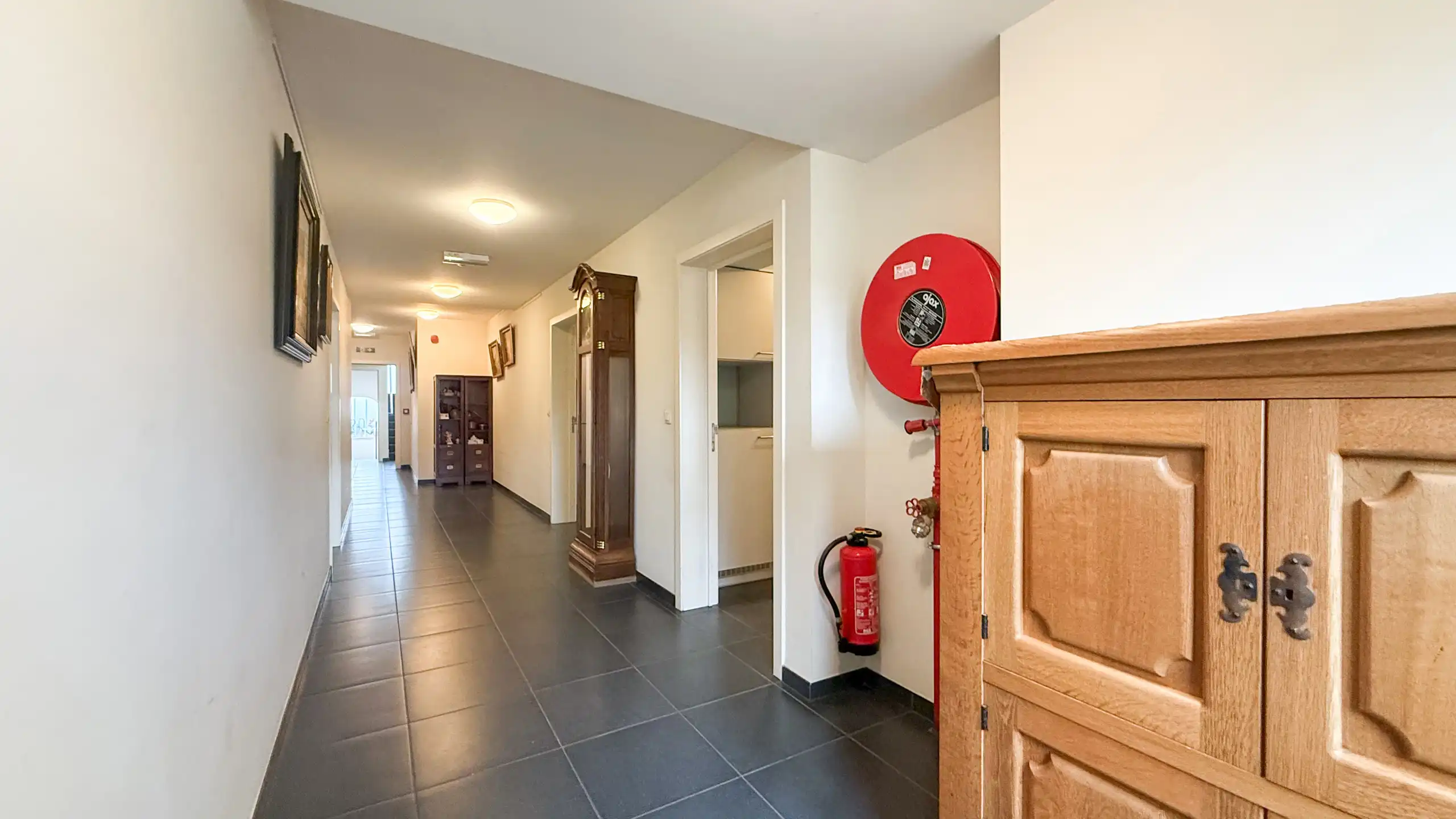 Veelzijdig investeringspand met 10 kamers, lift en kelder! foto 19