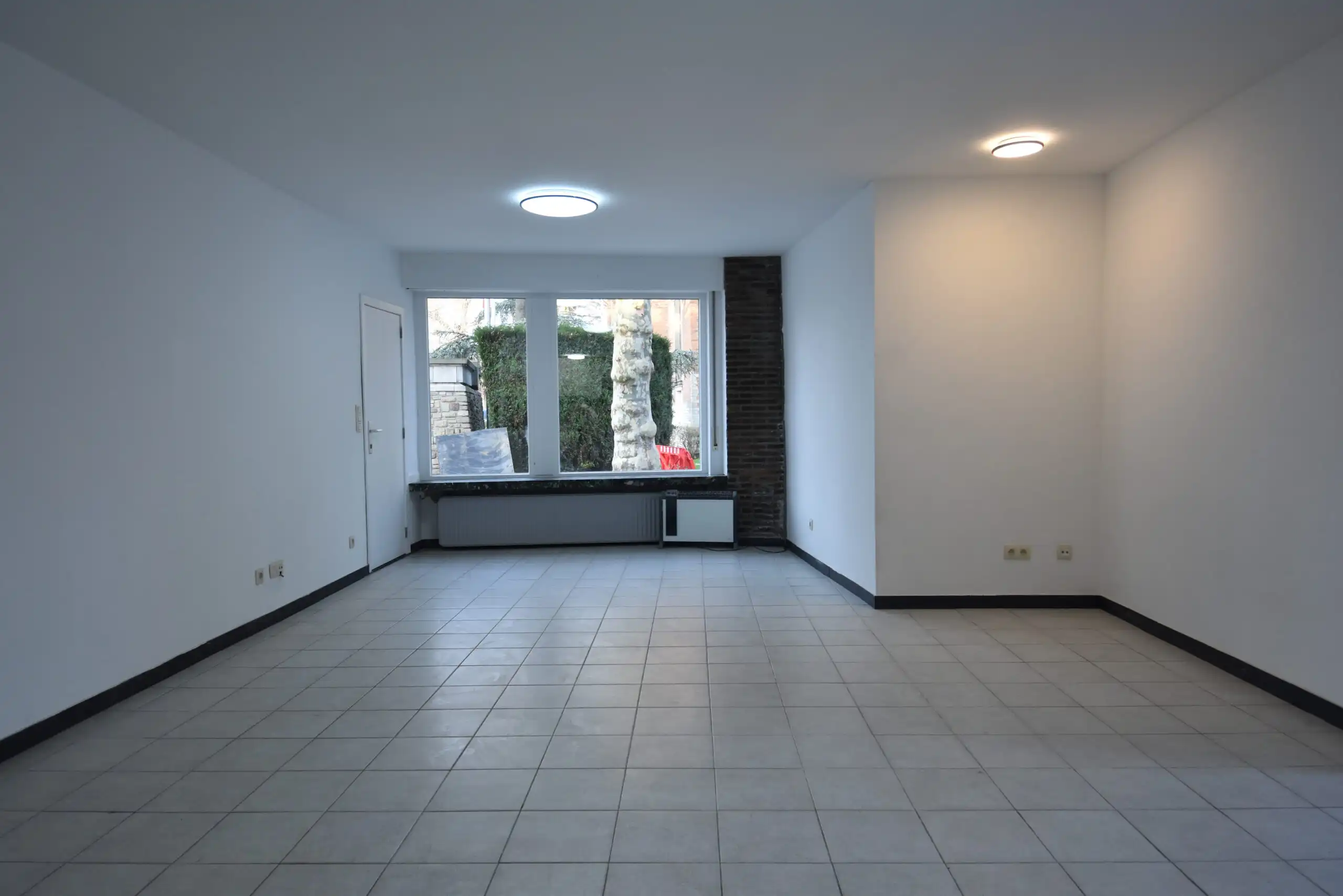 Instapklaar gelijkvloers appartement te huur in hartje Nieuwkerken foto 3