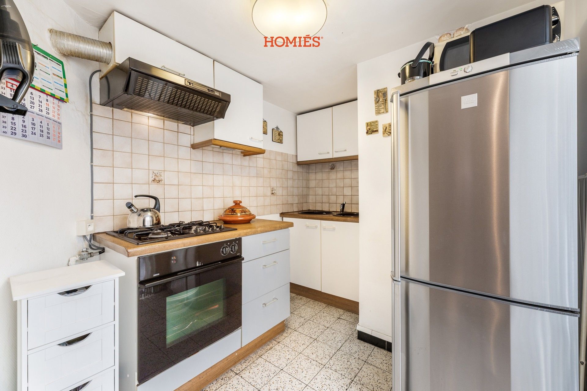 Te renoveren rijwoning op toplocatie in Kessel-Lo foto 5