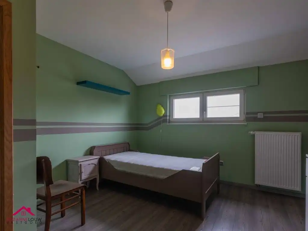 Instapklare gezinswoning met tuin foto 31