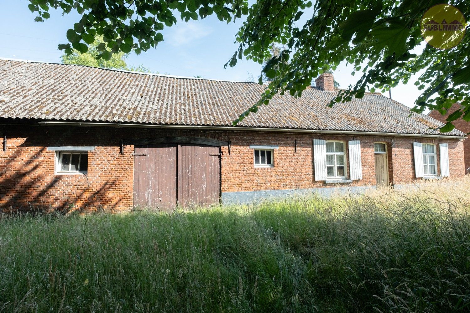 Hoofdfoto van de publicatie: Te renoveren langgevelhoeve op unieke locatie in Balen – 18.729 m² grondoppervlakte
