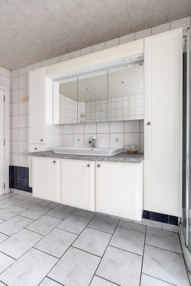 Halfopen gezinswoning met drie slaapkamers (mogelijkheid tot 4), grote tuin en zonnepanelen! foto 21