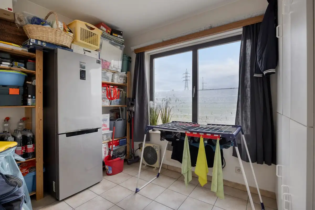 Opbrengsteigendom met 3 appartementen en 7 garages foto 29