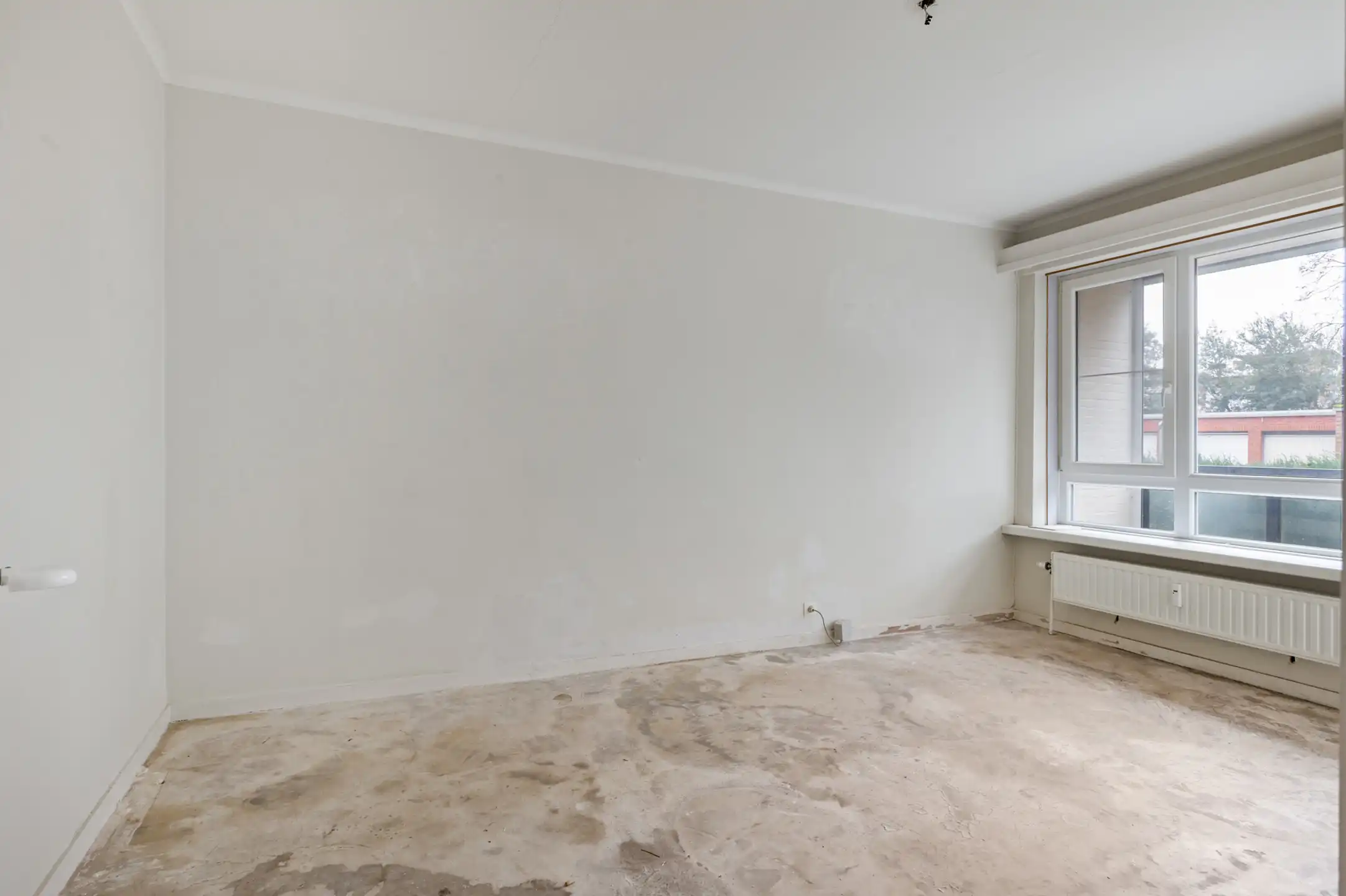 Te renoveren gelijkvloersappartement met terras foto 12