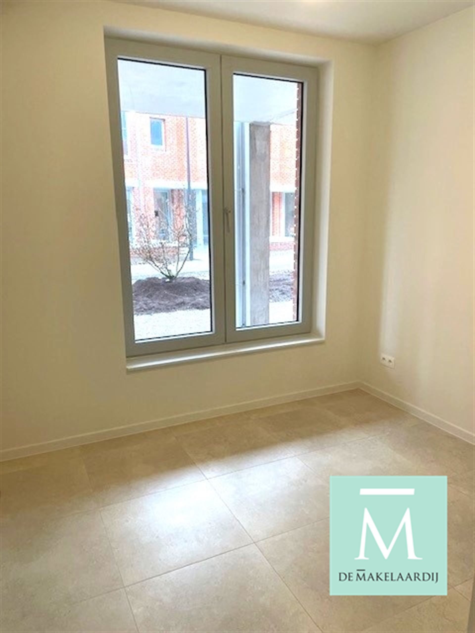 Gelijkvloers nieuwbouwappartement met 2 slaapkamers, terras/tuin op toplocatie! foto 6