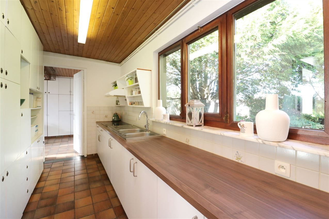 Rustig gelegen woning met 2 slpk, riante tuin en garage foto 9