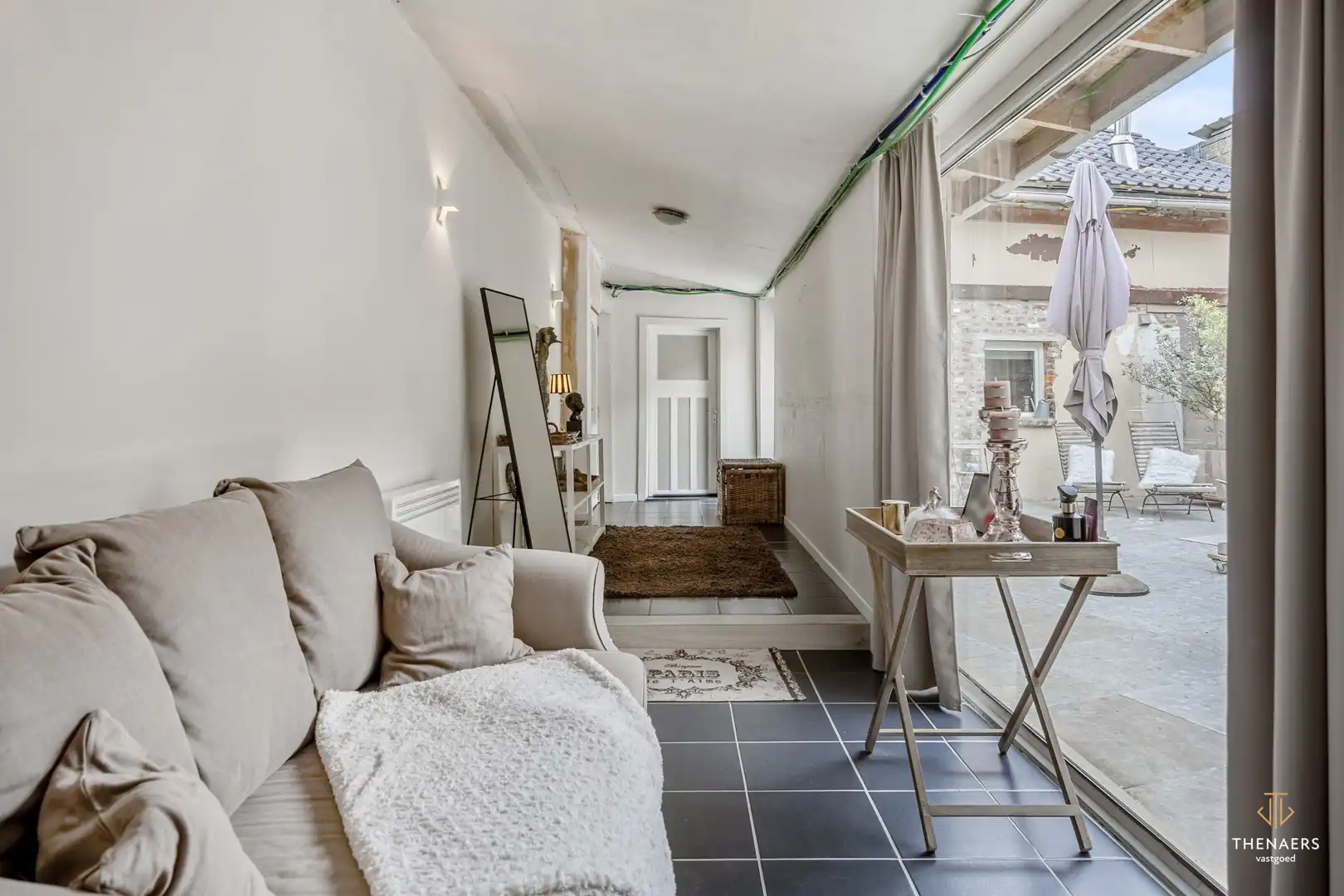 Karaktervolle hoevewoning met 3 slaapkamers, gezellige binnenkoer en tuin op een perceel van 370 m². foto 8