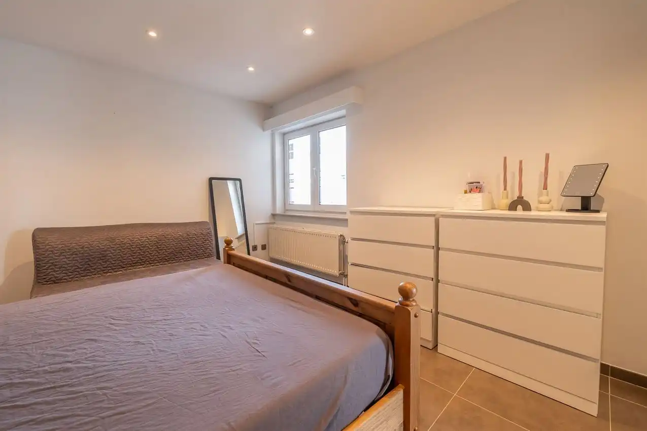 Appartement met twee slaapkamers, terras en autostaanplaats te midden van centrum foto 16