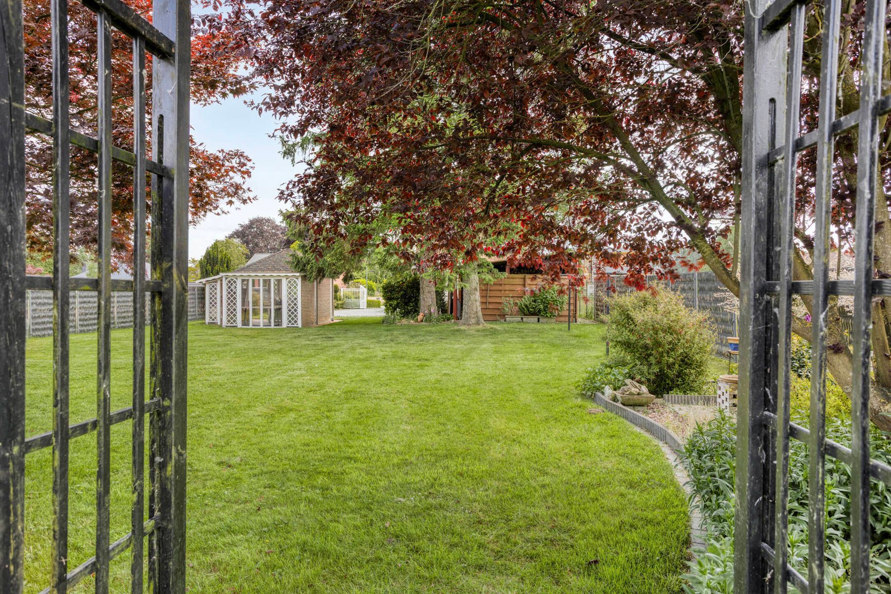 Open bebouwing met 4 slp, tuin, garage en prachtig uitzicht! foto 25