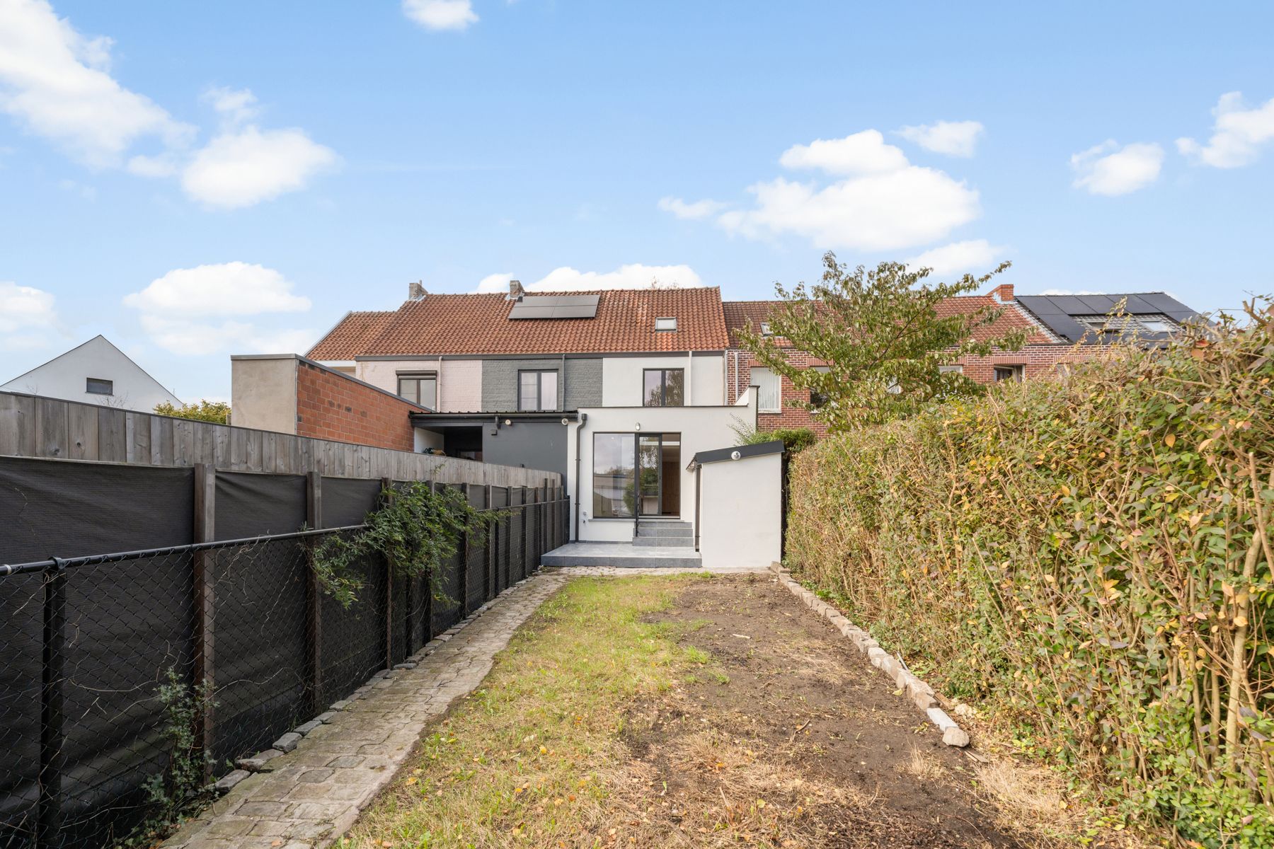 LABEL A: instapklare woning met 4 slaapkamers en grote tuin foto 2