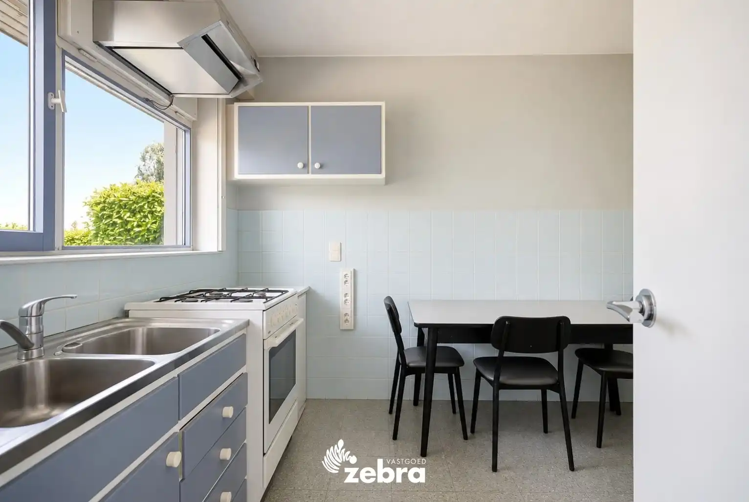 Te renoveren woning op een uitzonderlijk ruim perceel nabij het centrum van Tielt! foto 7