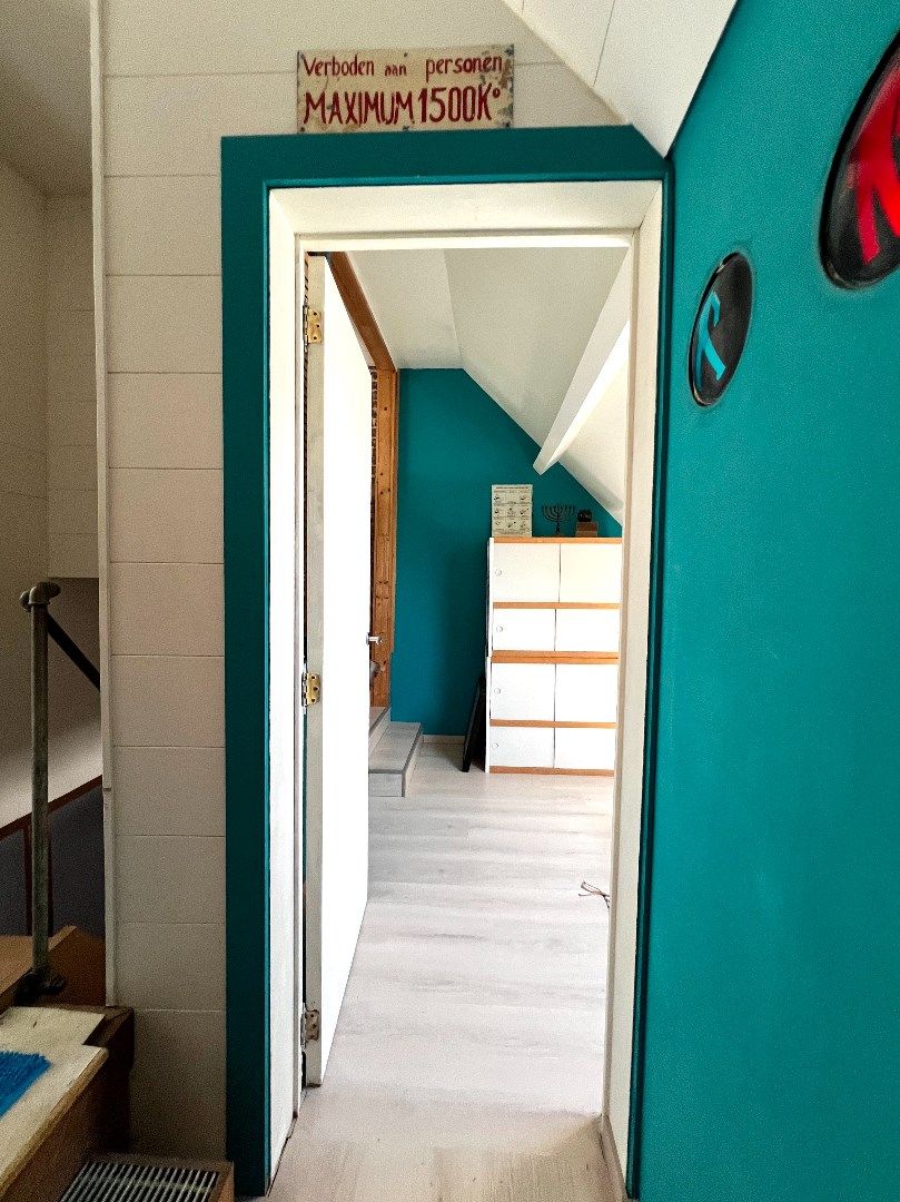 Kleurrijk, karaktervol en compleet uniek huis te koop pal in het centrum te Heule! foto 38