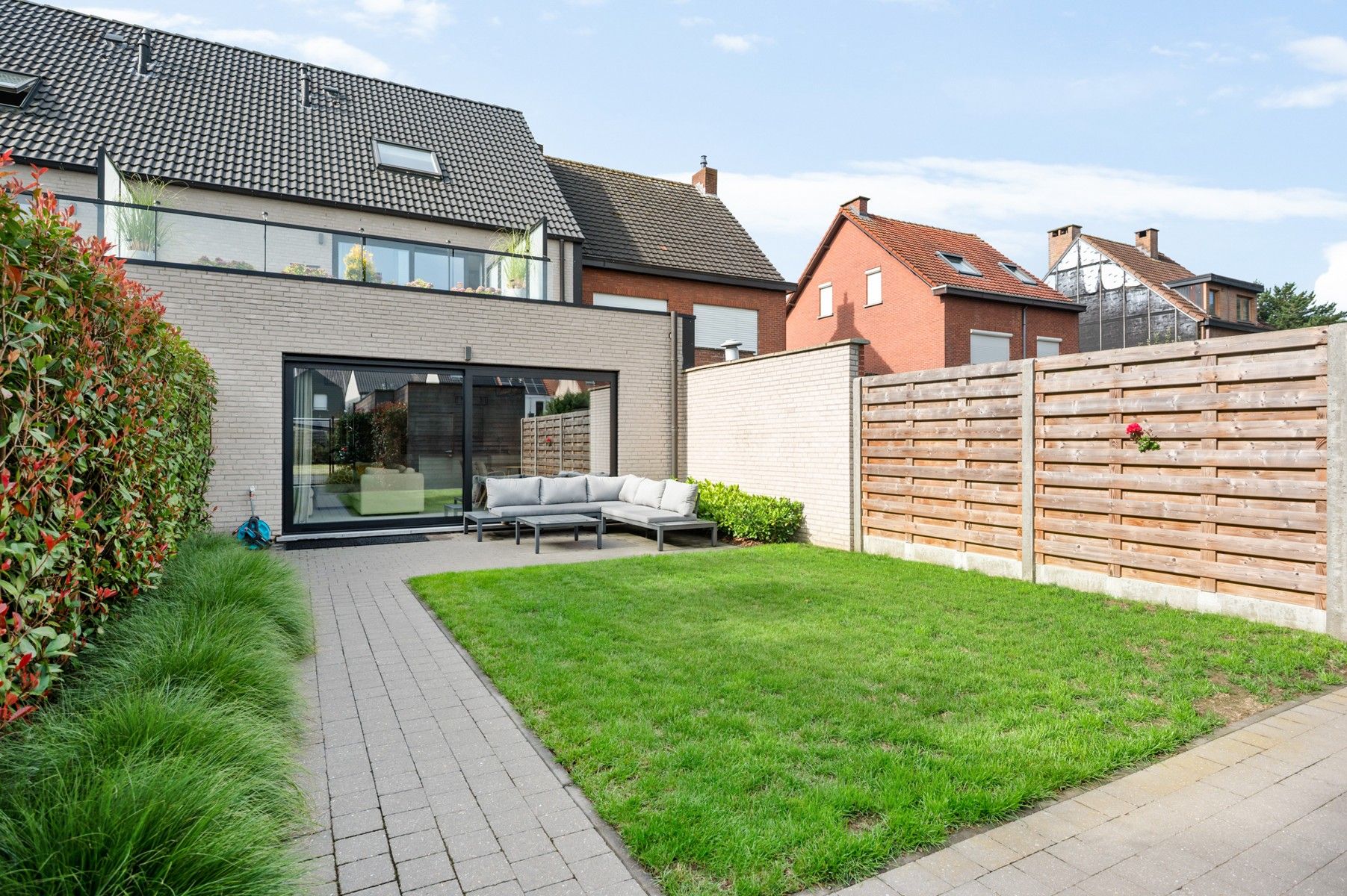 Instapklaar en energiezuinig gelijkvloers appartement met terras en tuin foto 9