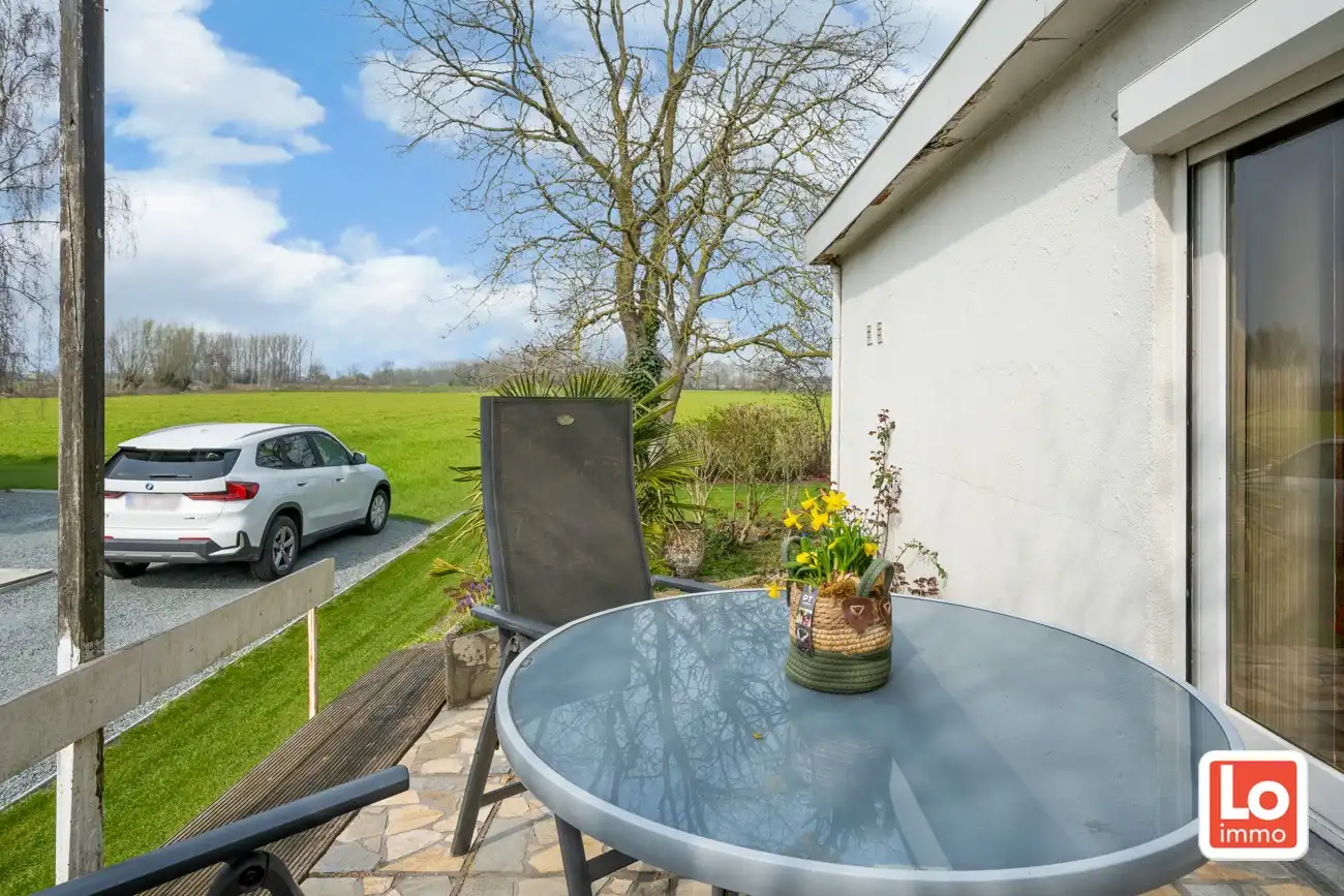 Ruime volledig te renoveren open gelijkvloerse prefab woning met inpandige garage en tuin met open zicht of perceel bouwgrond met afbraak/heropbouw mogelijkheden aan 6% BTW op een rustige locatie nabij het centrum van Zeveneken! foto 29