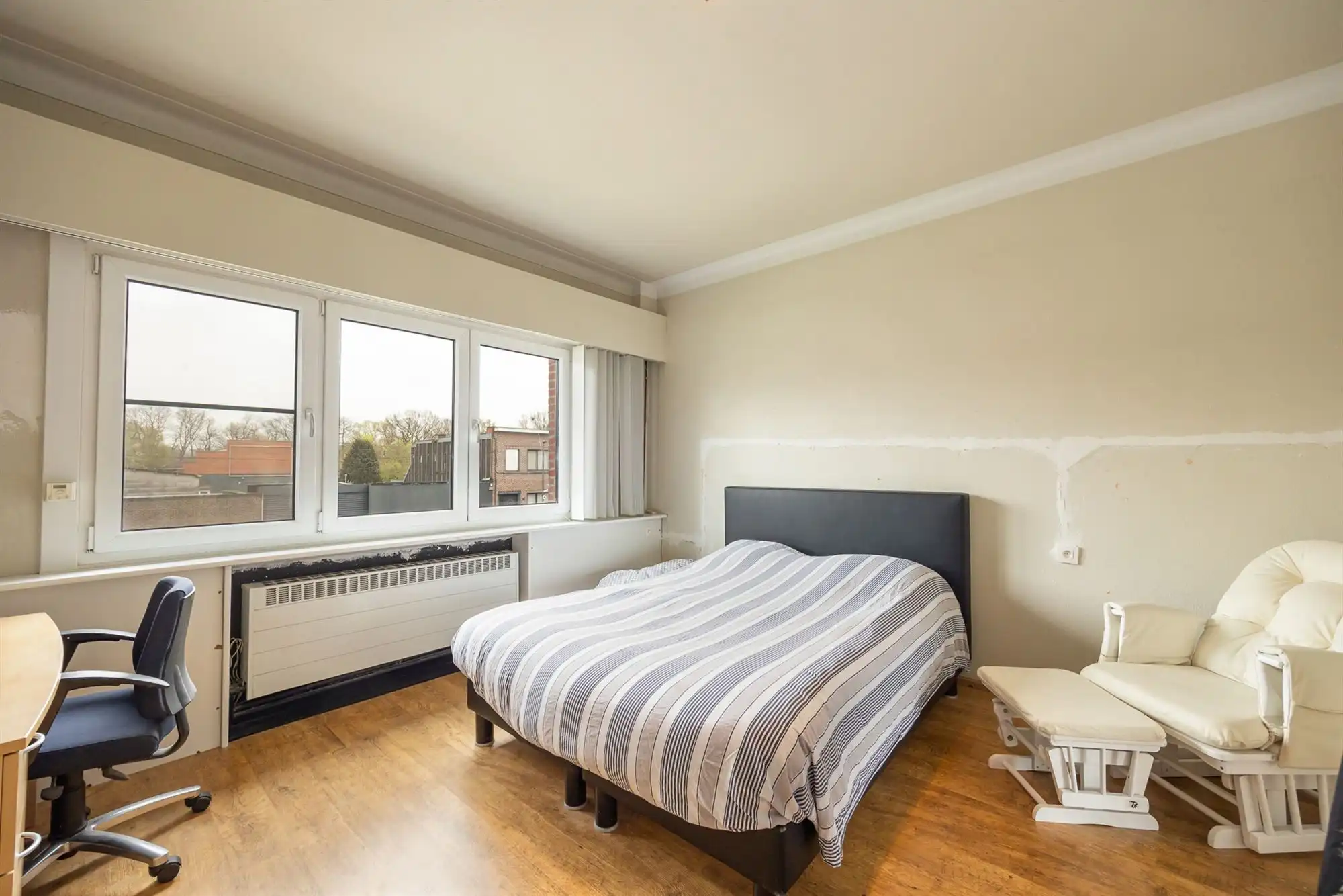 Instapklare gezinswoning met 3 à 4 slpk en zonnige tuin foto 12