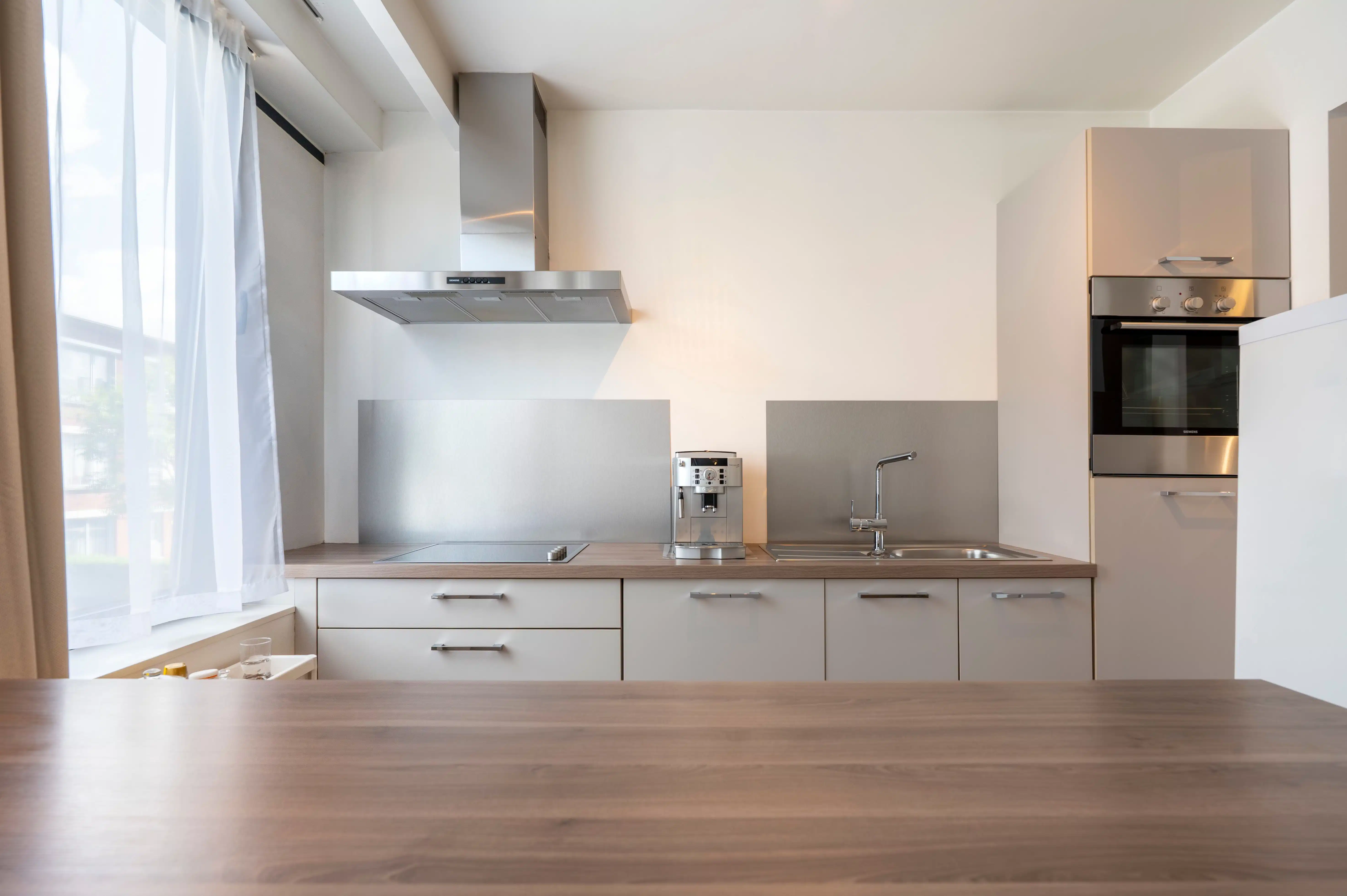 Lichtrijk twee slaapkamer appartement op centrale locatie te Merksem! foto 4