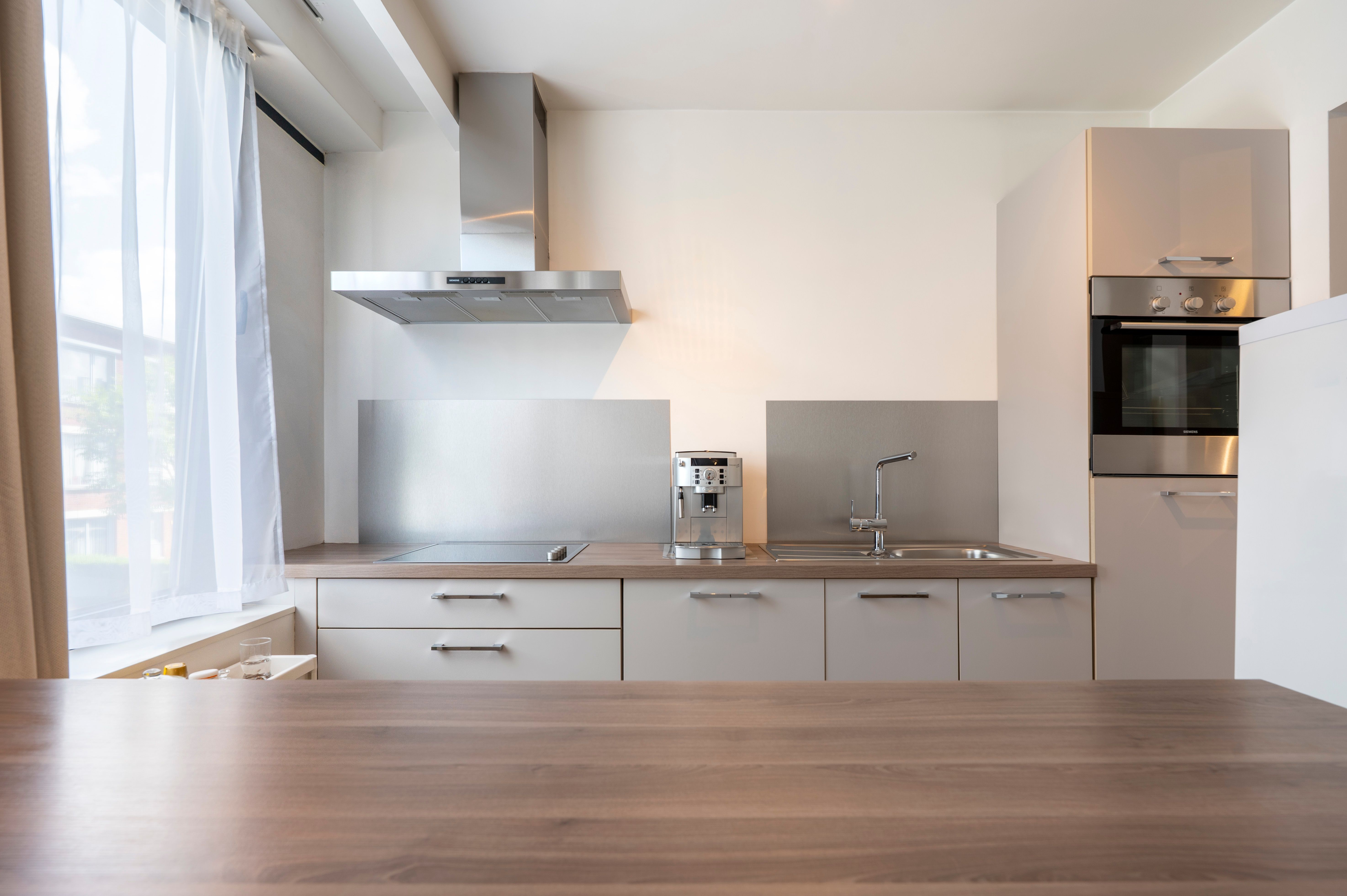 Lichtrijk twee slaapkamer appartement op centrale locatie te Merksem! foto 4