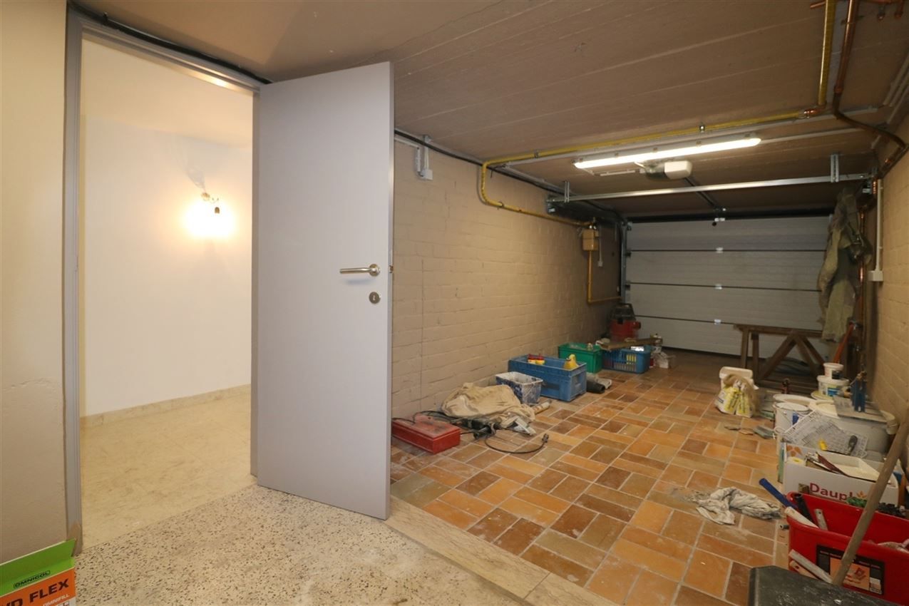 Rustig gelegen bel-etage woning met 3 slpk., 2 garages en leuk terras foto 29