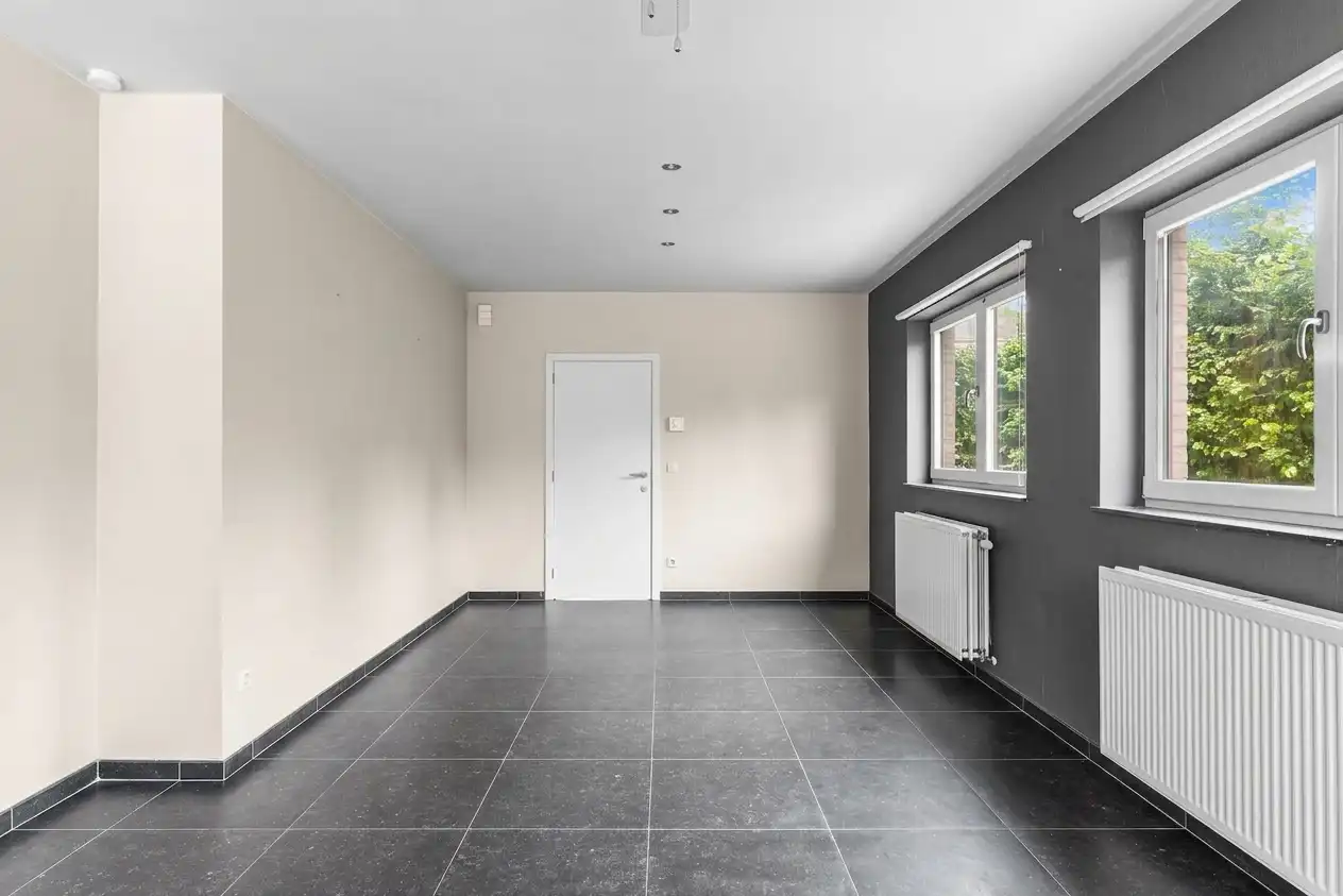 Instapklare halfopen bebouwing met 3 slaapkamers foto 3