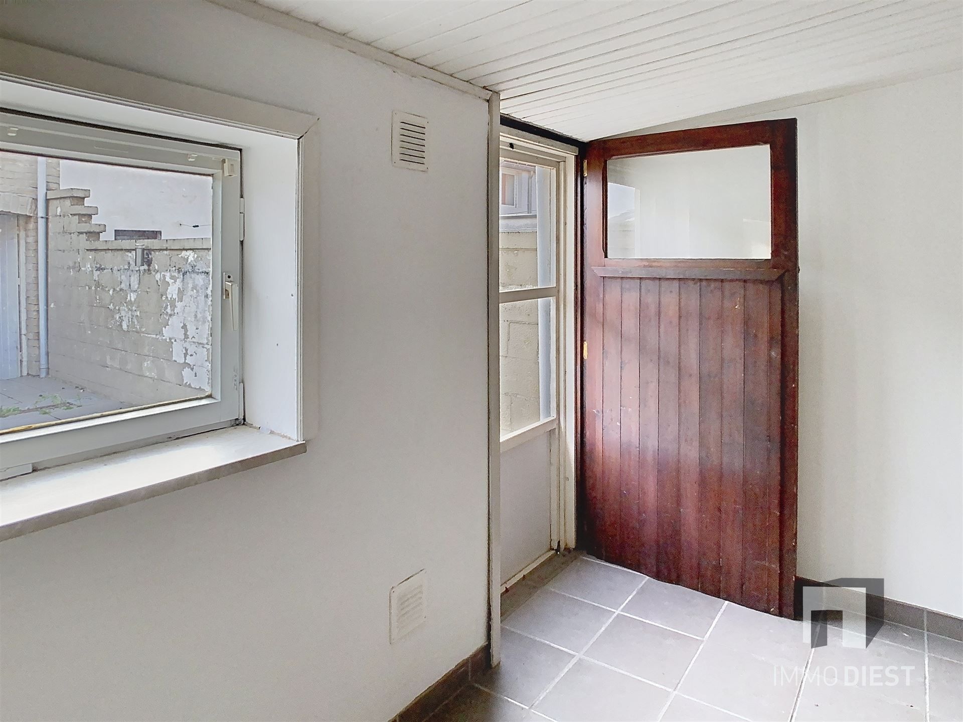 Gezellige rijwoning met terras en tuin foto 18