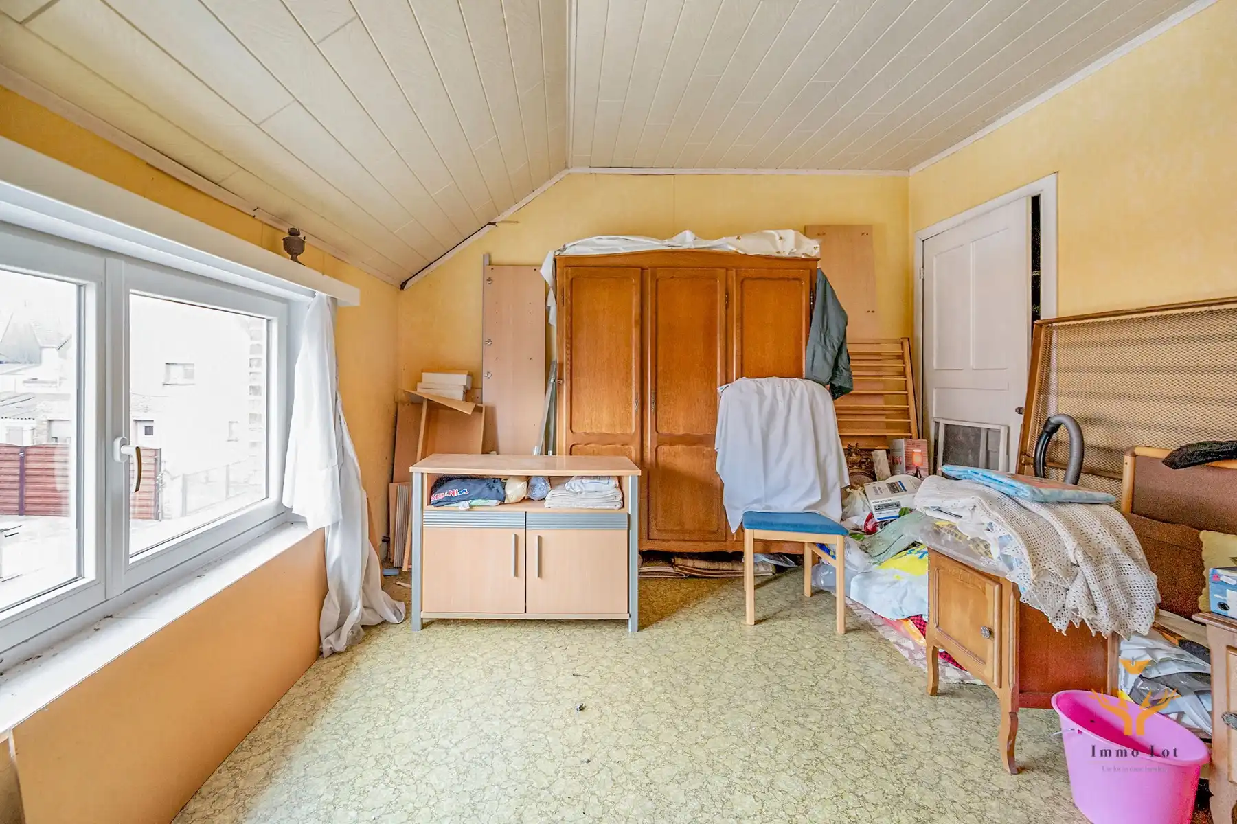 Ideale te renoveren starterswoning in hartje Berlare foto 11