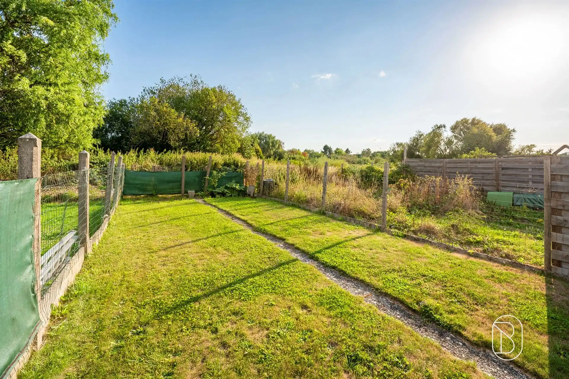 Degelijke woning met veel potentieel & aangename tuin  foto 3