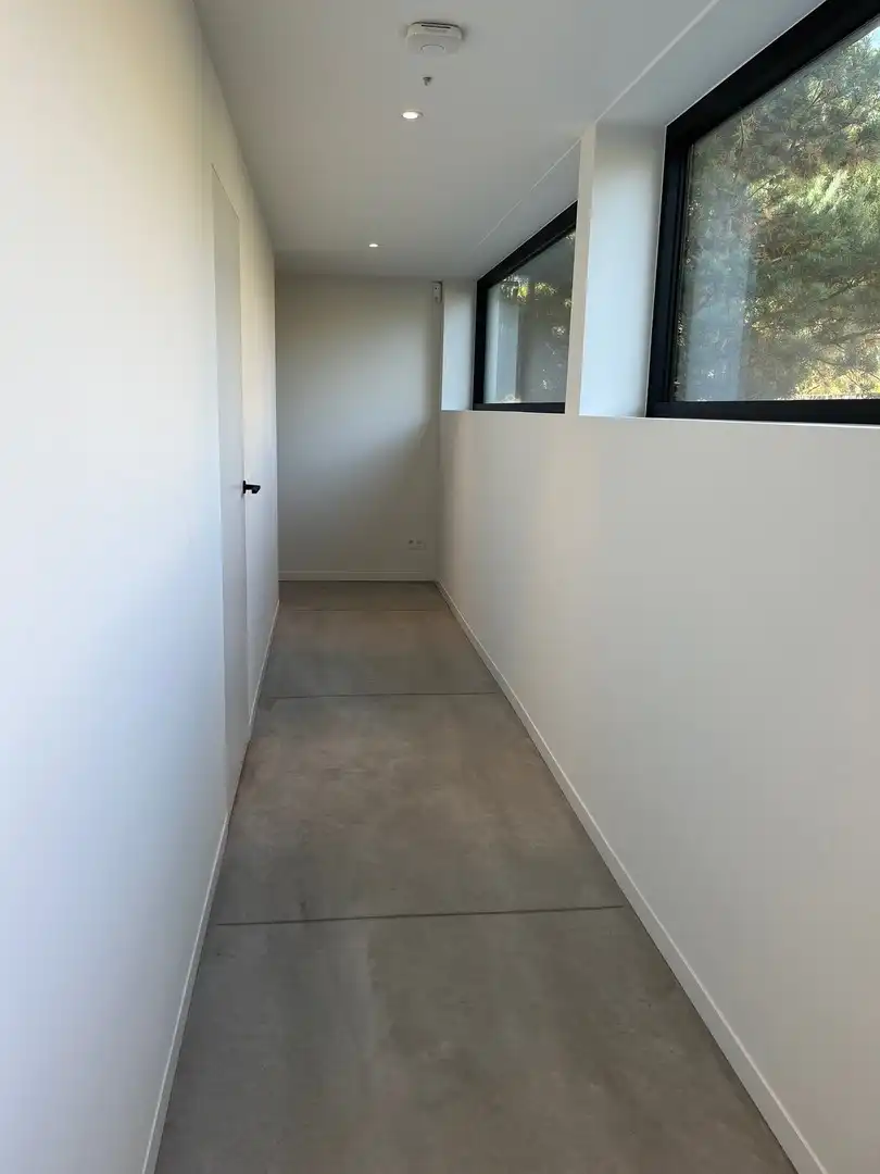 Recent gebouwde, energiezuinige villa gelegen in een rustige dreef van een centraal gelegen villawijk te Knokke-Heist. foto 14