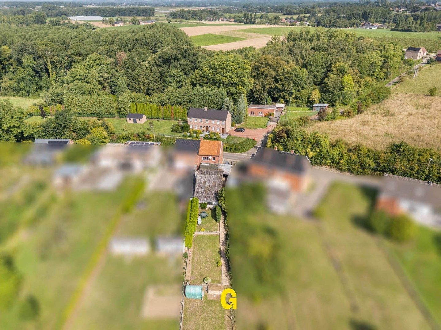 Te renoveren halfopen woning op mooi perceel van 10a 67ca op rustige, groene locatie in Vliermaal foto 4