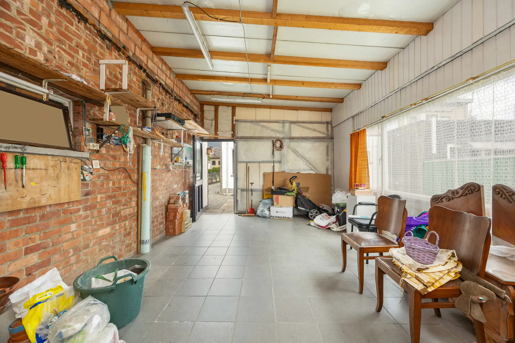  Halfopen bebouwing met tuin en garage foto 17