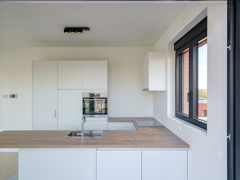 Ruim 2slpk-appartement met zuid-west georiënteerd terras aan de ‘Nieuwe Dokken’. Een appartement met een fenomenaal zicht over het water en de Gentse skyline! foto 5