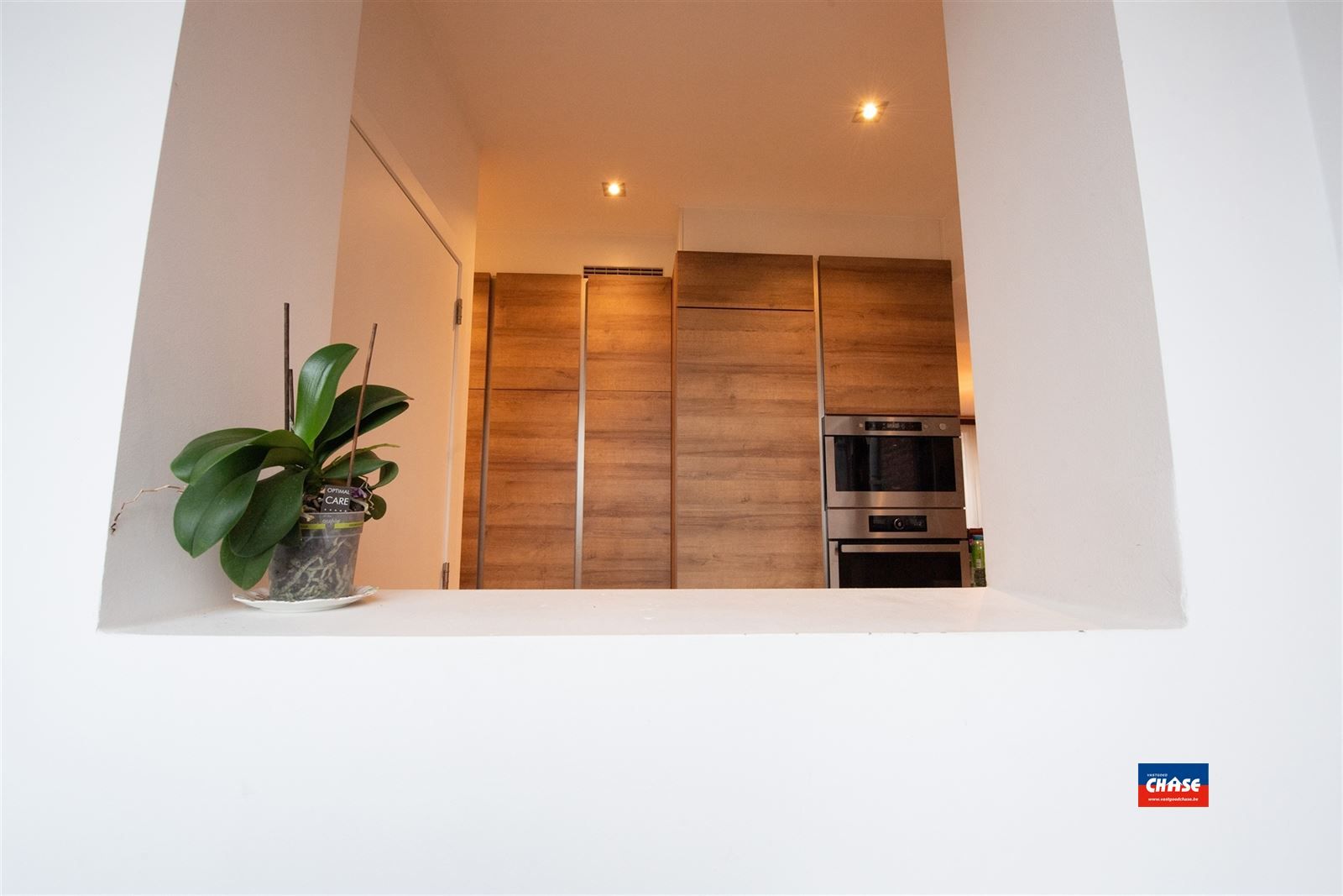 Handelshuis met groot appartement, garage en tuin foto 35