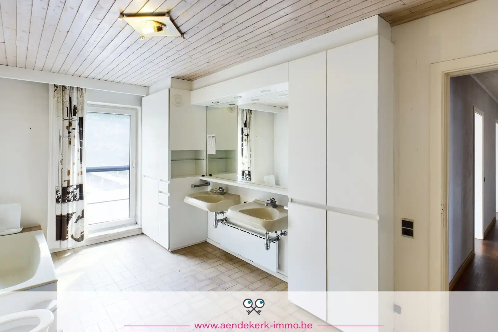 Woning met handelsruimte in het centrum van Kinrooi foto 30