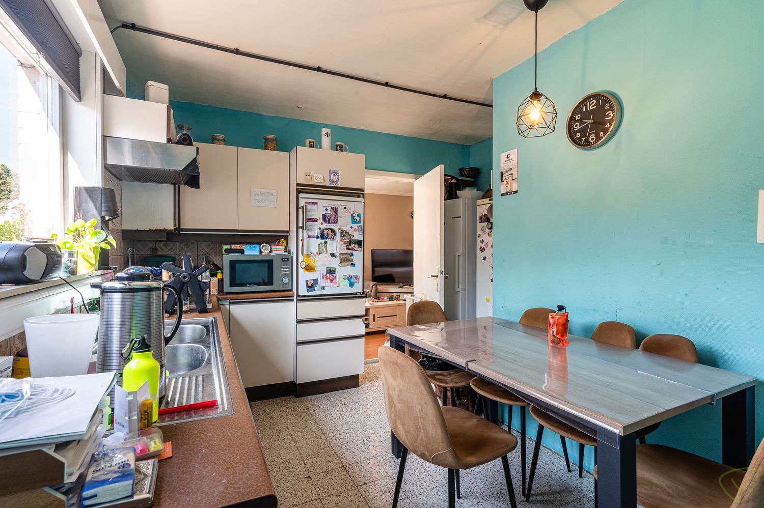 Te renoveren gezinswoning met grote tuin in het centrum van Bassevelde foto 8