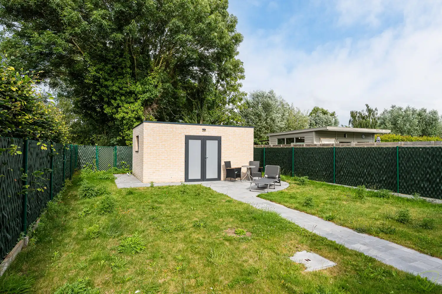 Rustig gelegen woning in de doodlopende straat op enkele minuten van het sportpark. foto 19