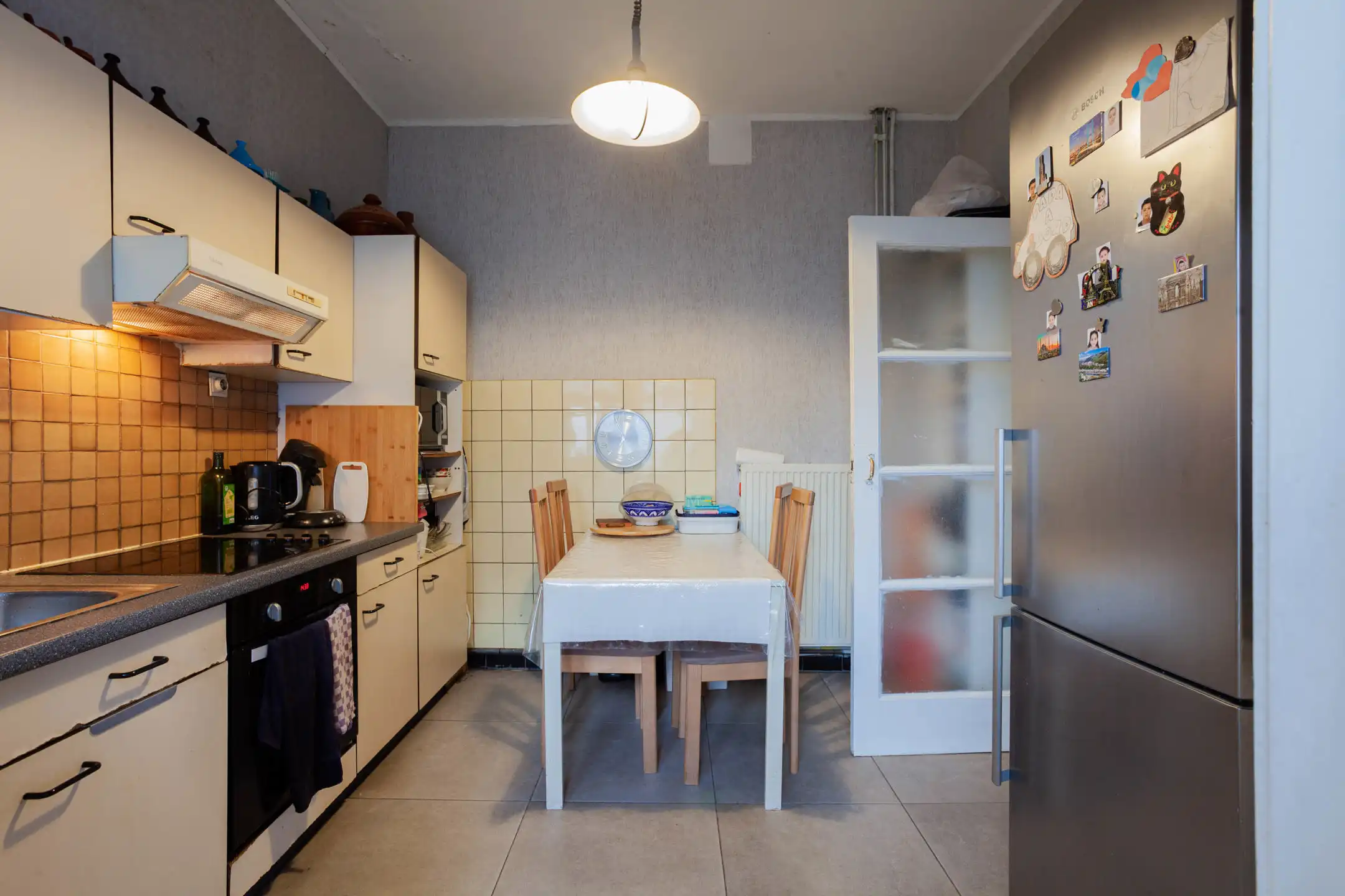 Opbrengsteigendom met handelsruimte en 2 grote appartementen foto 19