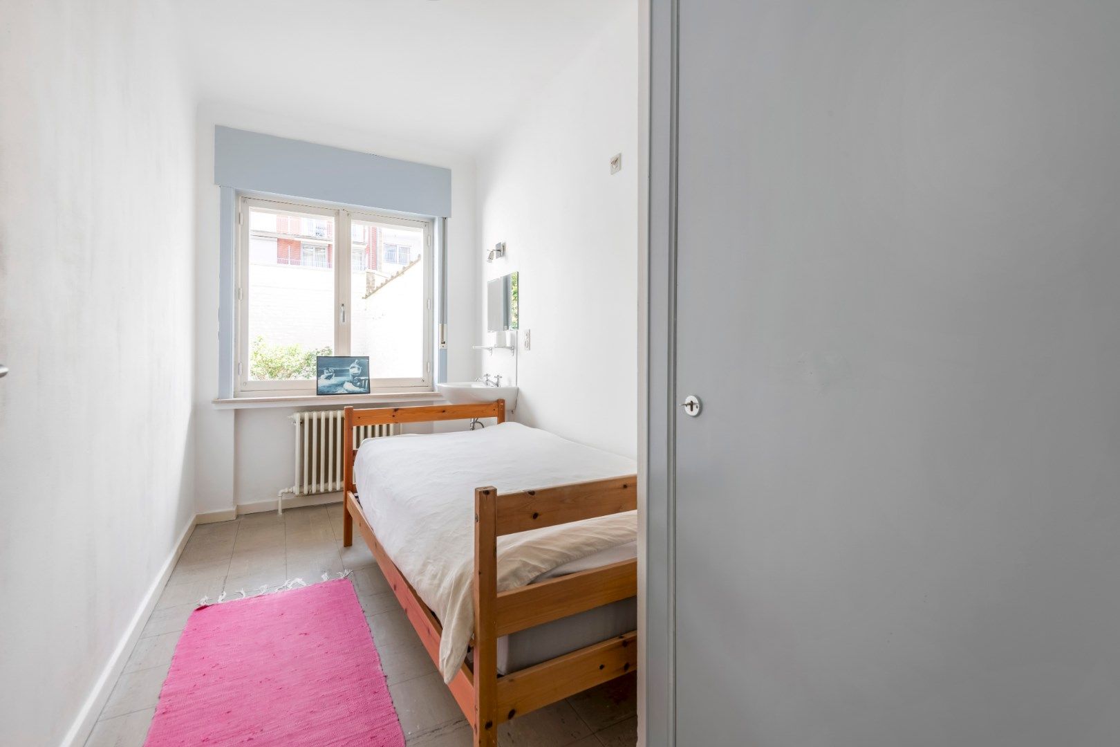 Ruim gelijkvloersappartement met 7,5m gevelbreedte en met binnenkoer 50m² gelegen vlakbij de Dumortierlaan foto 12