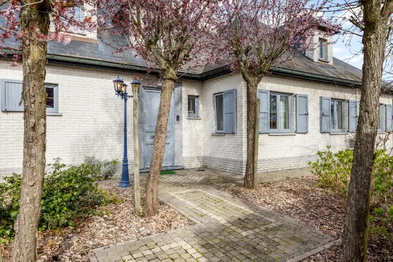 Luxueuze villa met 4 slaapkamers, prachtige tuin en hoogwaardige afwerking in Tildonk foto {{pictureIndex}}