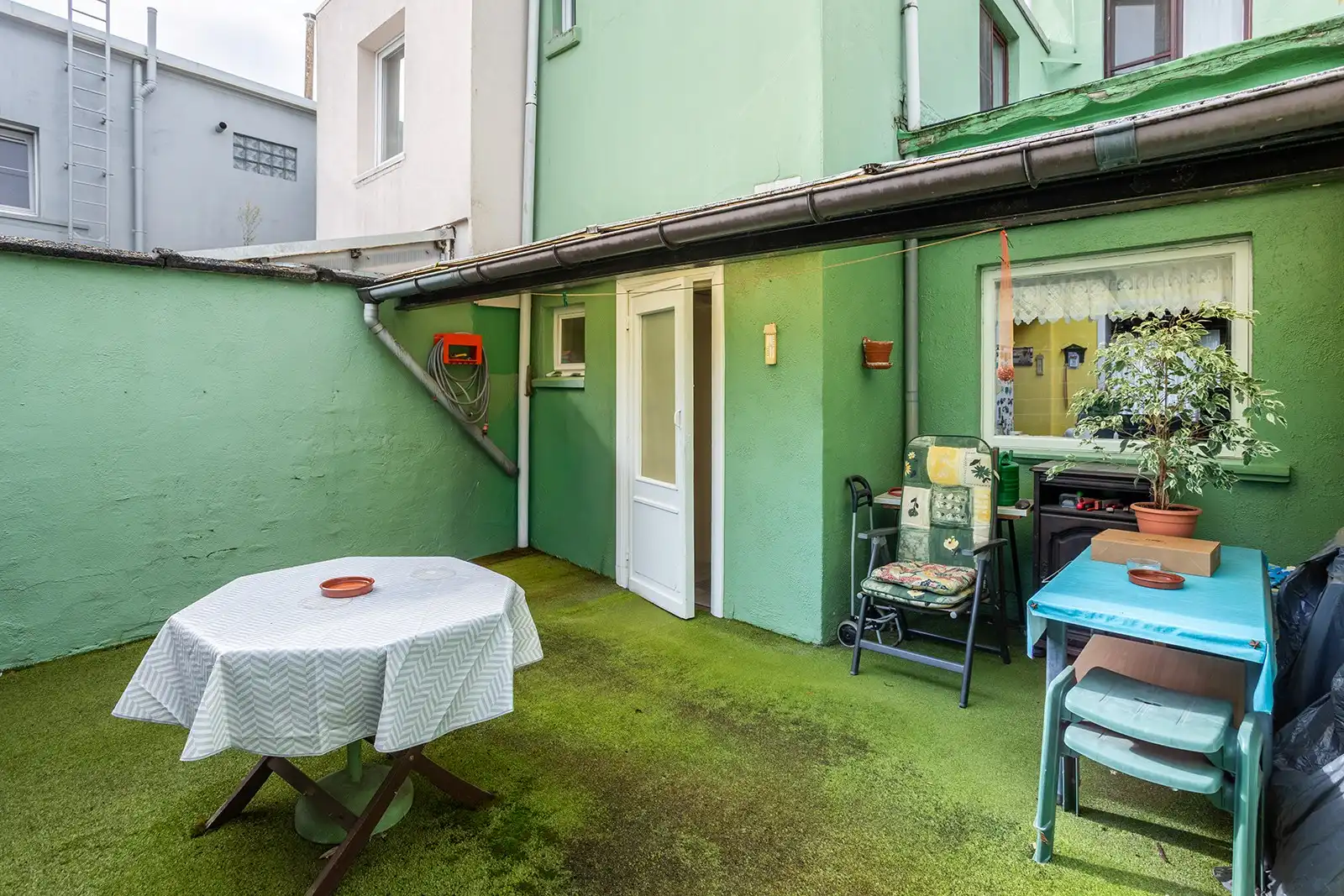 Woning met veel potentieel en zuidwestgerichte stadskoer  foto 19