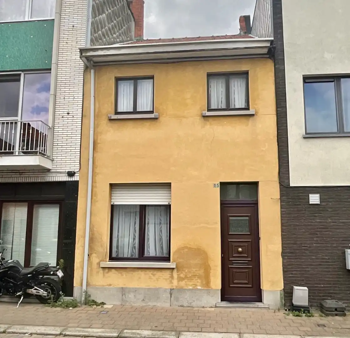 Op te frissen rijwoning foto {{pictureIndex}}