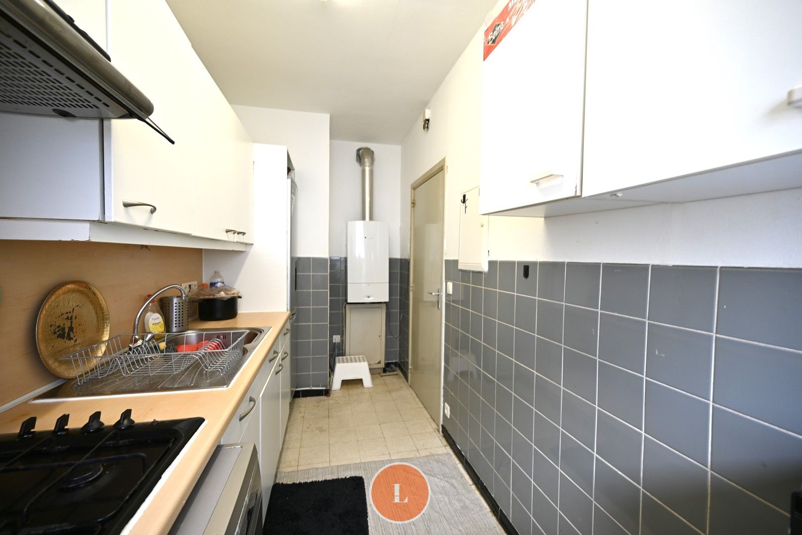 Opbrengst appartement met 2 slaapkamers en garage te koop in Roeselare! foto 4