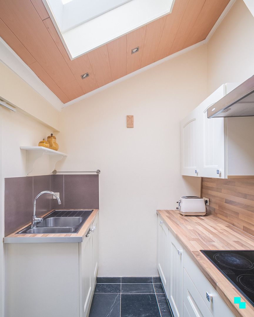 Charmante woning met drie slaapkamers in het hart van Merelbeke foto 15