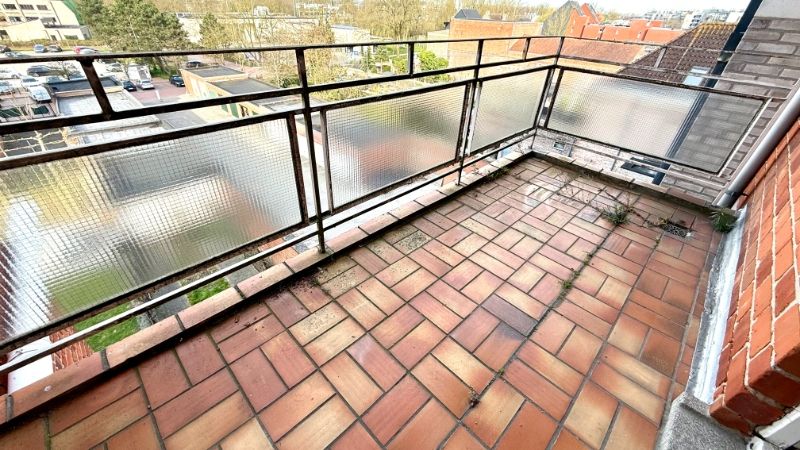 Gezellig en verrassend ruim appartement met 2 slaapkamers en veel potentieel in het hart van Deinze foto 8