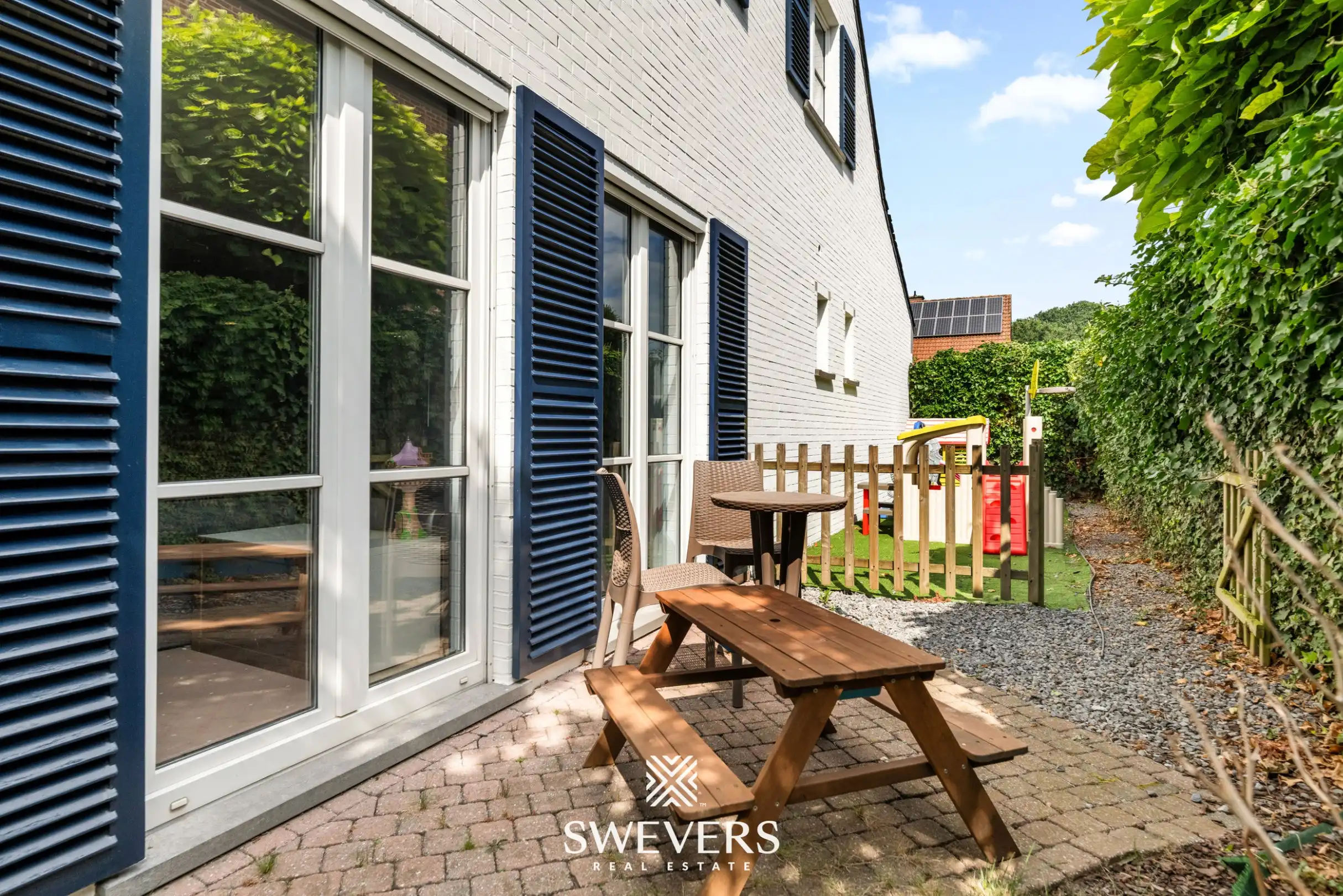 Instapklare ruime gezinswoning met zuidwestelijke tuin in Tuilt foto 27