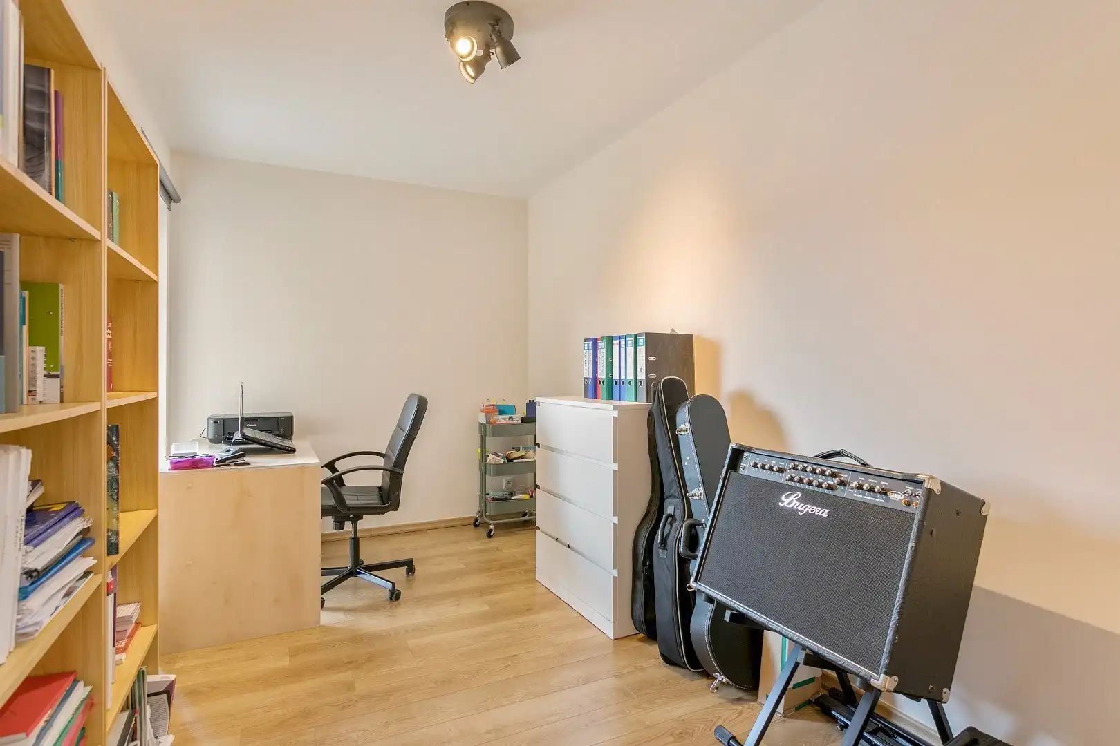 Modern, gelijkvloers appartement met 2 slpk, ondergrondse parking en tuin. foto 12